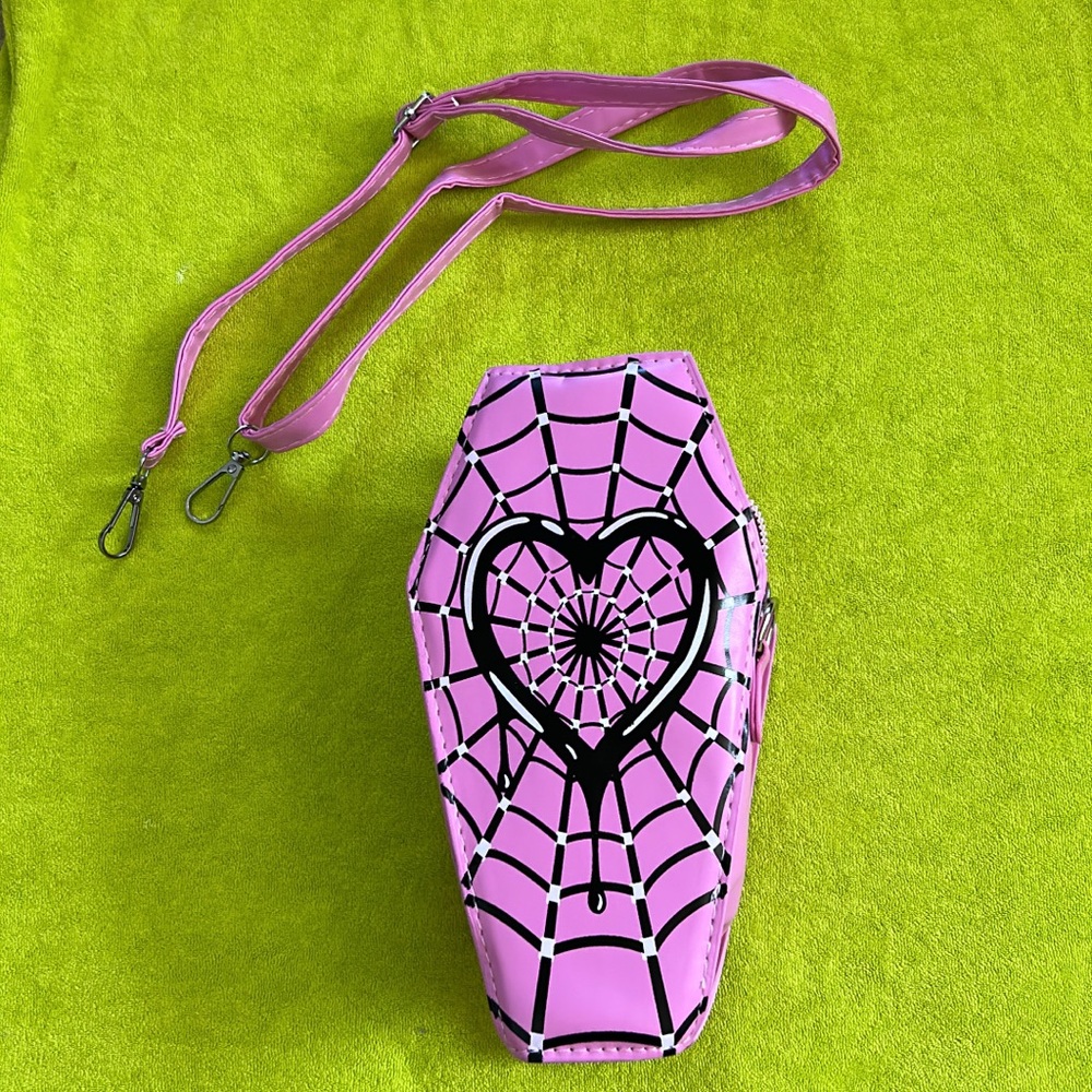 Pink spiderweb purse